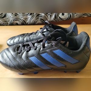 Adidas soccer cleats and shin guards